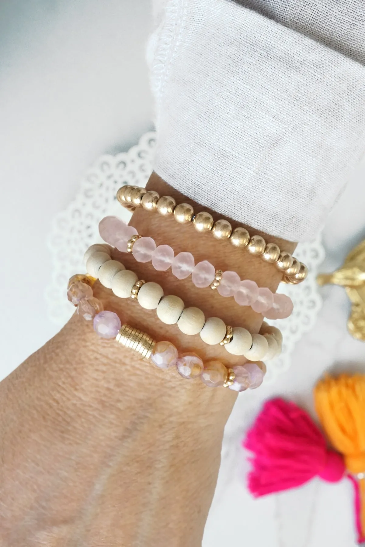 Beaded Bracelets Set of 4 bracelets Pink glass metal and natural wood beads