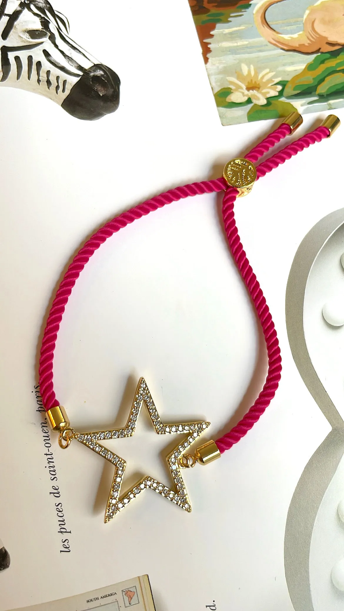 Charm with colored bracelets